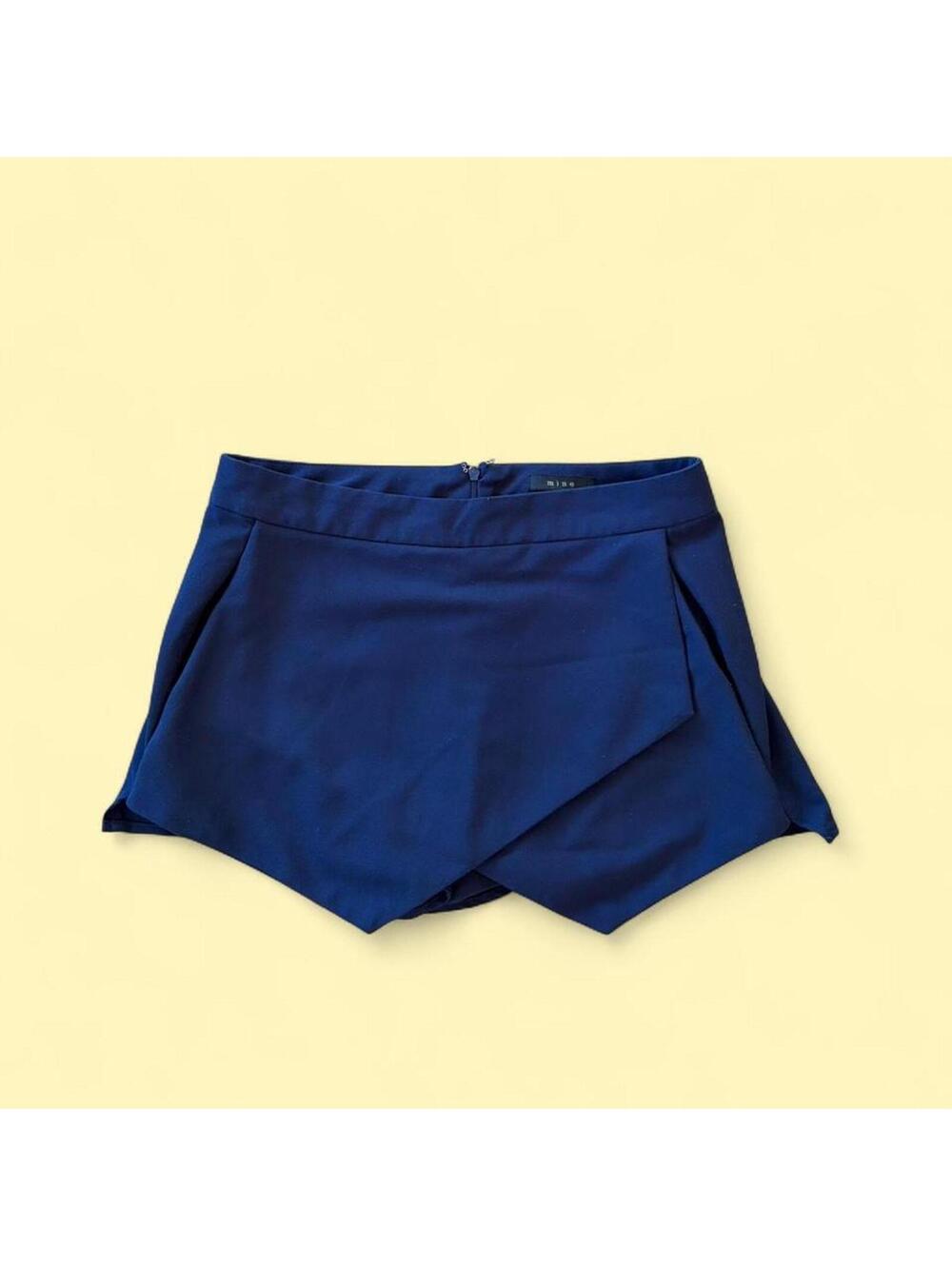 Mine navy blue tailored mini skort/shorts with back zipper detail.